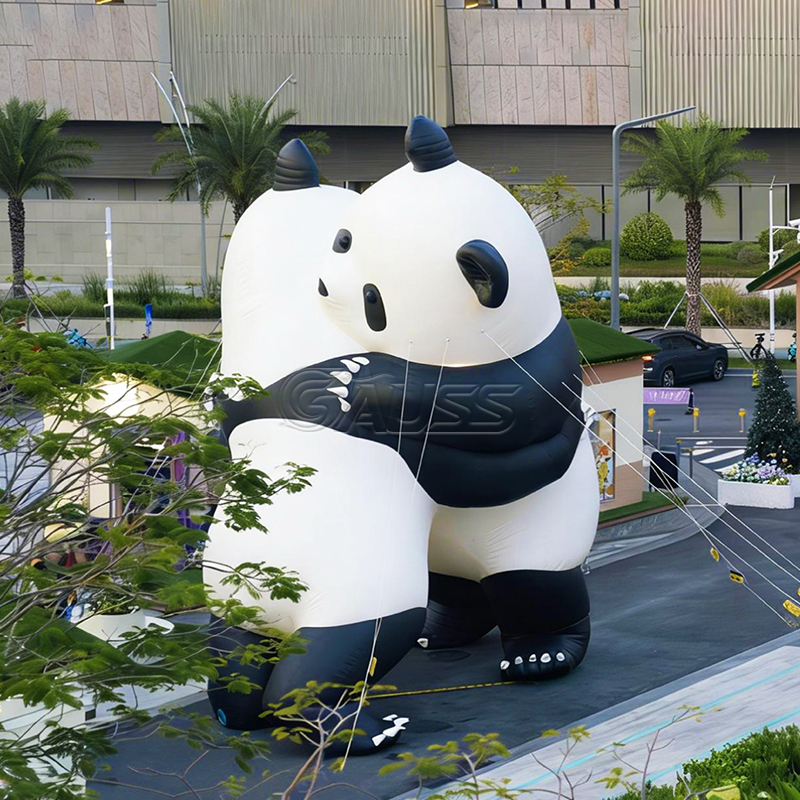 GIANT HUGGING PANDAS